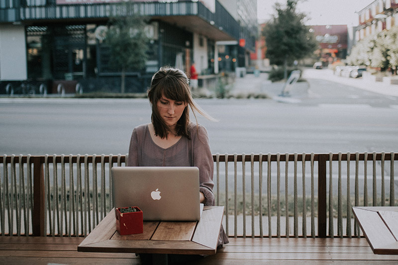 Woman watching document production tutorial